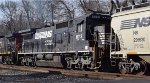 NS 8713 C40-8 trails BNSF 6811 ES44C4 and CN 2577 C44-9W with an NS unit grain train westbound through Mableton Ga 3-34PM 01-10-2015